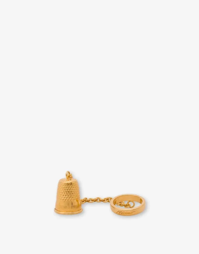 Metal ring with charm